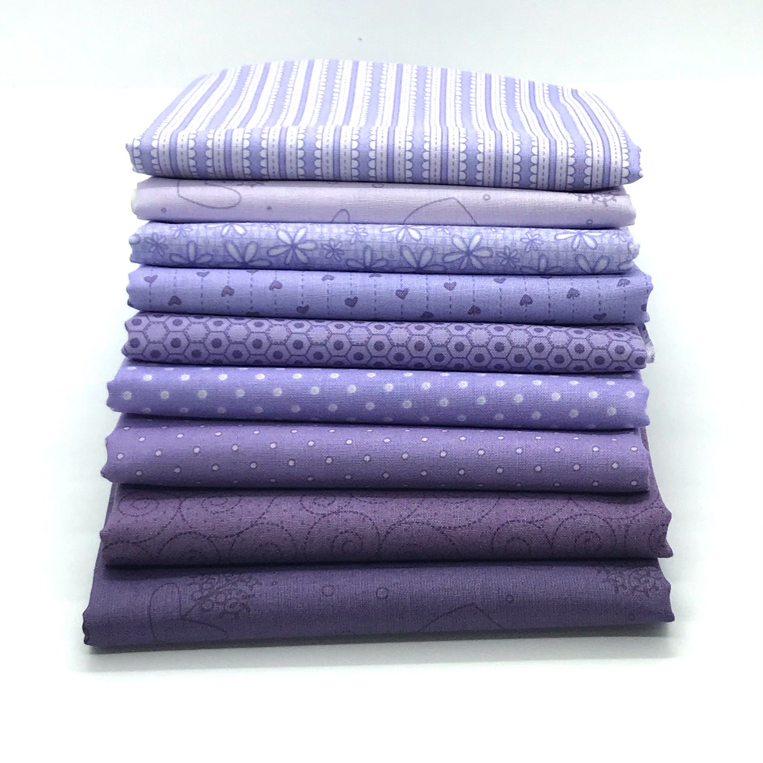 Fat quarter bundle from the Red Rooster basically hugs collection in purple