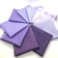 Fat quarter bundle from the Red Rooster basically hugs collection in purple