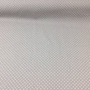 silver or grey spotted cotton fabric by rose and hubble
