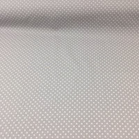 silver or grey spotted cotton fabric by rose and hubble