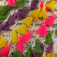 Tassel trim in purple green pink and yellow