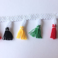 Black, yellow red and green tassle fringe trim